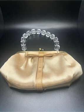 vintage champagne satin clutch lucite handle kiss lock purse bow detail